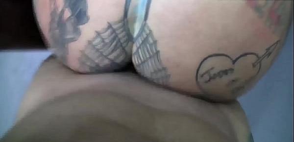 Full body tattooed milf with pussy piercing fucks in front of the video camera